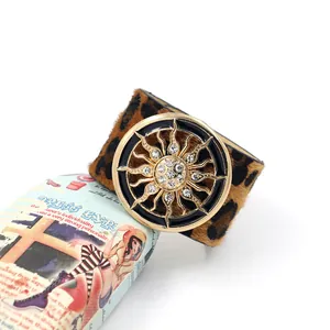 Fashionable leopard print pony hair wide leather cuff with sun-patterned crystal buckle
