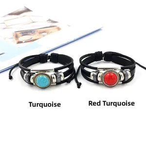 Detail of bohemian braided leather bracelets with red and blue turquoise bead accents