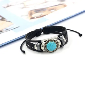 Detailed macro of multi-layer leather bracelet with turquoise stone and silver beads
