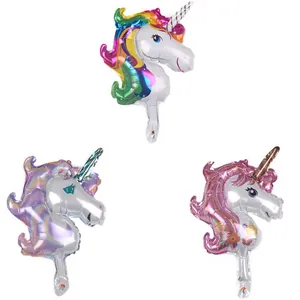 Three colorful unicorn foil balloons for birthday party decoration in high-gloss metallic finish
