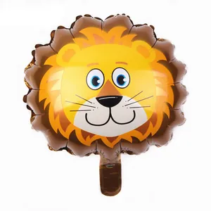 Detail of cartoon lion foil balloon with glossy metallic finish and air valve