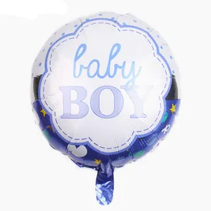 Detail of round baby BOY foil balloon with blue patterns for newborn birthday party decor