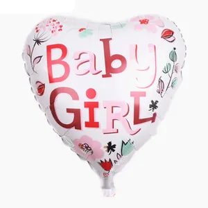 Close-up of heart-shaped foil balloon with Baby Girl text and floral print for parties