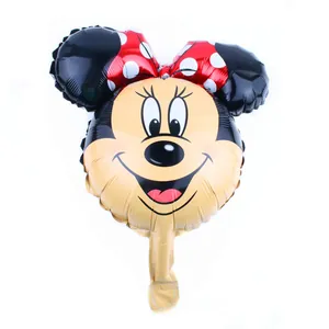 Detail of Minnie Mouse head shape foil balloon with red polka dot bow for party decor
