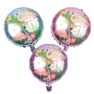 Detail of round flamingo foil balloons in pink, blue, and purple for party decor
