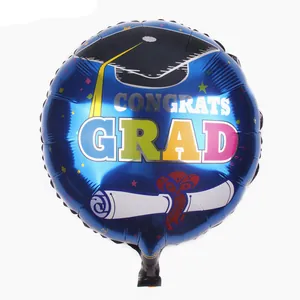 Close-up of blue foil balloon with Congrats Grad text and graduation cap design