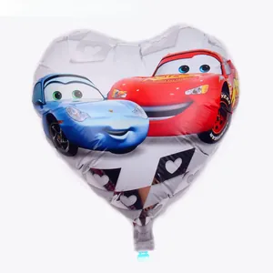 Detailed close-up of heart-shaped foil balloon with Lightning McQueen cartoon character