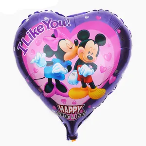 Detail of purple heart foil balloon with Mickey and Minnie kissing print and text