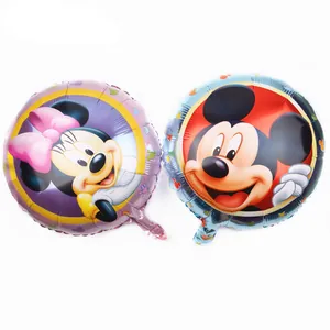 Detail of round Mickey and Minnie Mouse foil balloons with metallic finish for parties