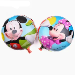 Detail of round Mickey and Minnie Mouse foil balloons with glossy metallic finish