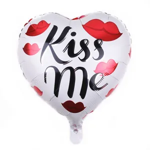 18-inch heart-shaped foil balloon with red lip prints and black Kiss Me text for party