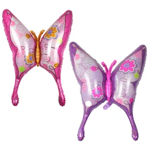 Pink and purple butterfly foil balloons with floral patterns for birthday party decor