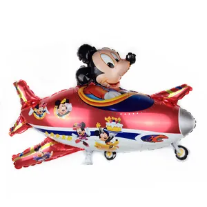 Detail of red airplane-shaped foil balloon featuring Disney Mickey Mouse party graphics