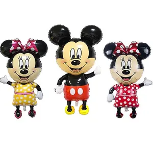 Detail of Mickey and Minnie Mouse shaped foil balloons for birthday party decorations