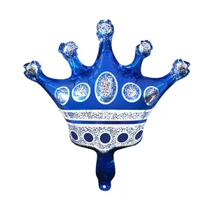 Dettaglio del palloncino blu a corona in alluminio con glitter argento per feste