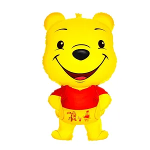 Detail of Winnie the Pooh aluminum balloon featuring colorful character prints for parties