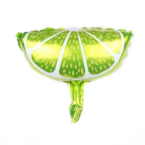 Detail showing a lime slice foil balloon with green peel and yellow pulp textures