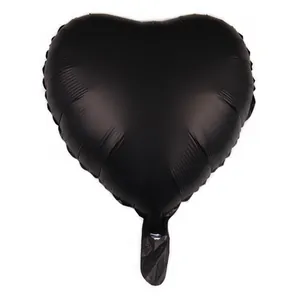 Detailed close-up of an 18-inch heart-shaped balloon in premium matte black foil material