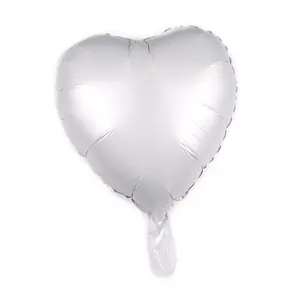 Detail of metallic silver heart-shaped foil balloon showing the valve and smooth texture