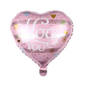Pink heart foil balloon with I Love You print and colorful floral patterns for wedding decoration