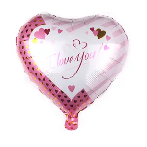 Close-up of heart-shaped foil balloon with pink stripes and I love you message print