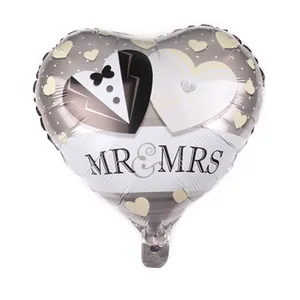 Heart-shaped foil balloon with Mr & Mrs tuxedo and wedding dress design for party decor