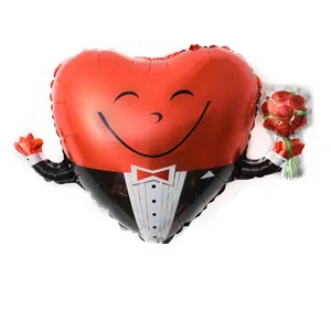 Detail showing groom tuxedo print on heart shaped foil balloon with smiling face
