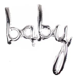 Close-up of a silver script BABY foil balloon for infant birthday party decorations