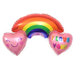 Rainbow heart-shaped foil balloon with I Love You text and cute smiling face design