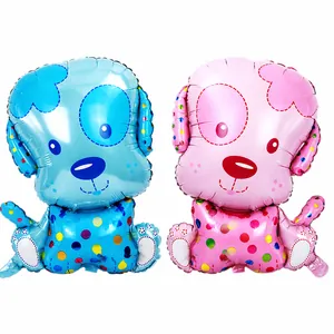 Close-up of blue and pink puppy foil balloons with lovely dog text and polka dots