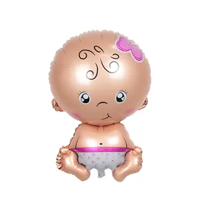 Detailed view of baby shaped foil balloon with pink polka dot bow for party decor