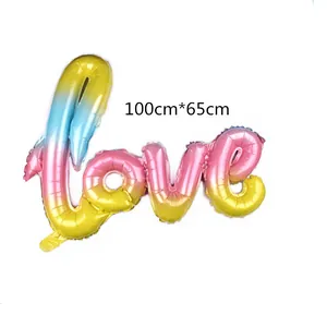 Detailed view of Love script foil balloon in gradient pastel colors with 100cm*65cm size