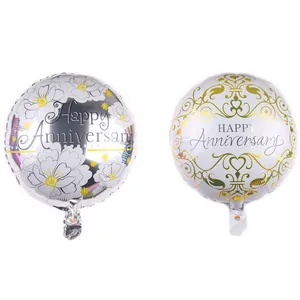 Detailed view of 18-inch Happy Anniversary foil balloons with gold and silver patterns