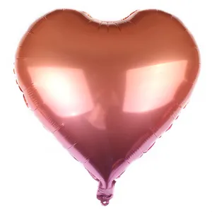 Rose gold heart-shaped foil balloon with glossy metallic finish for party decorations