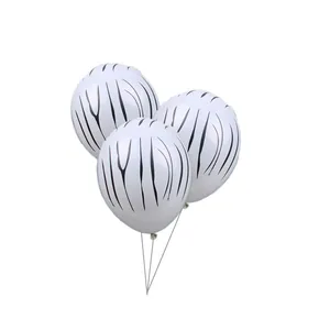 Three oval zebra print aluminum balloons for parties and wedding celebrations on white background