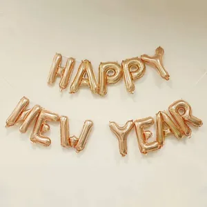 Rose gold Happy New Year foil balloon set for festive party decoration on neutral background