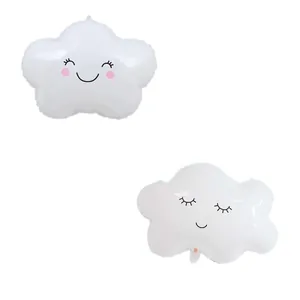 Detailed view of smiling cloud and star-shaped white foil balloons for party decoration