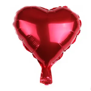 Detailed view of glossy red heart foil balloon with metallic finish and heat-sealed edges