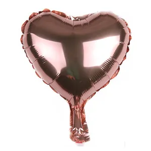 Detail of a 10 inch heart shaped rose gold foil balloon with metallic luster finish