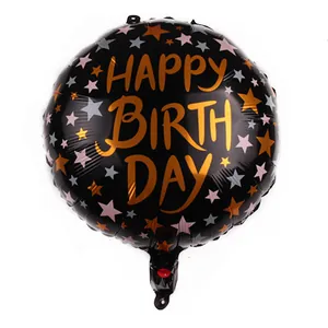 Detail of 18-inch black round foil balloon with golden Happy Birthday text and stars