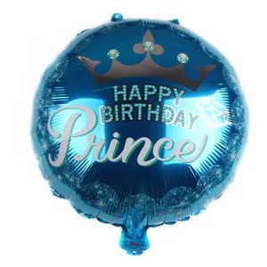 Detail of blue 18-inch round foil balloon featuring Happy Birthday Prince text and crown