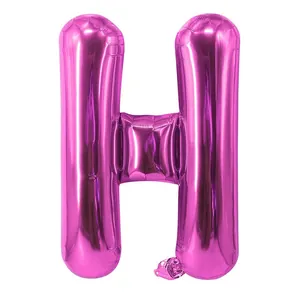 Détail d'un ballon en aluminium de 16 pouces en forme de lettre H rouge rose festif