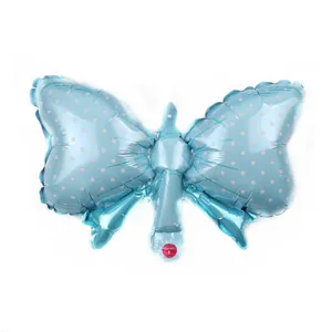 Light blue butterfly foil balloon with white polka dots for party decorations