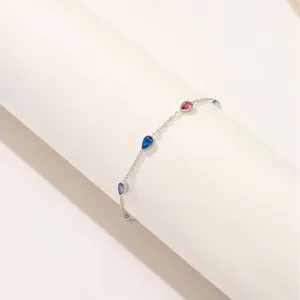 Elegante 18K vergulde titanium stalen armband met kleurrijke peervormige zirkoniasteen