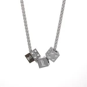 Hip hop silver wheat chain necklace featuring three iced-out dice pendants with number 1