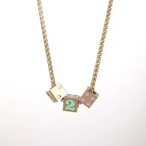 Golden titanium steel necklace with dice pendants featuring number 2 and colorful dots