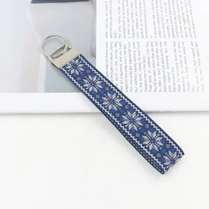Ethnic style woven lanyard keychain with blue snowflake pattern and silver metal ring