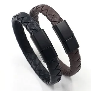 Detail of woven leather bracelets with black matte magnetic clasps in black and brown