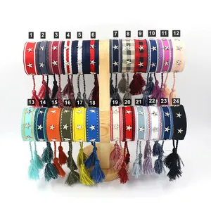Colección de pulseras trenzadas con dijes de estrella y flecos en varios colores
