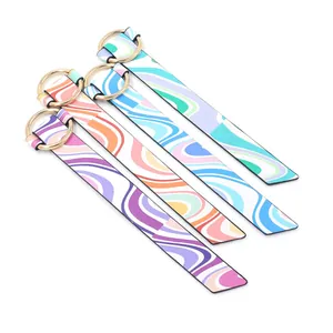 Close-up of colorful wave pattern PU leather bracelets with gold metal ring buckles